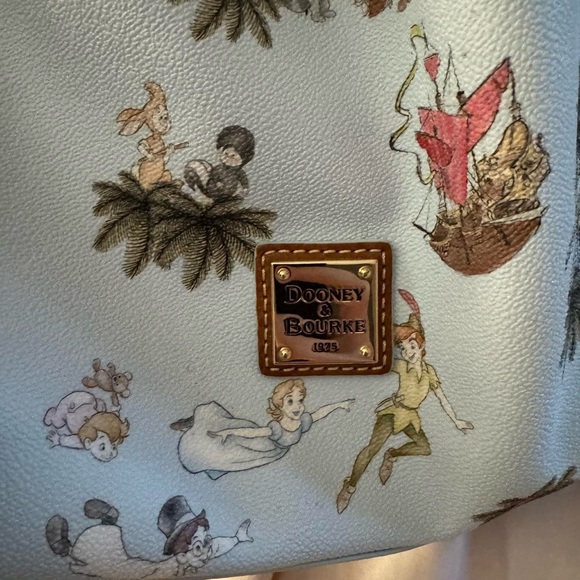 Dooney & Bourke Handbags - Dooney & Bourke Peter Pan bucket bag and matching wallet